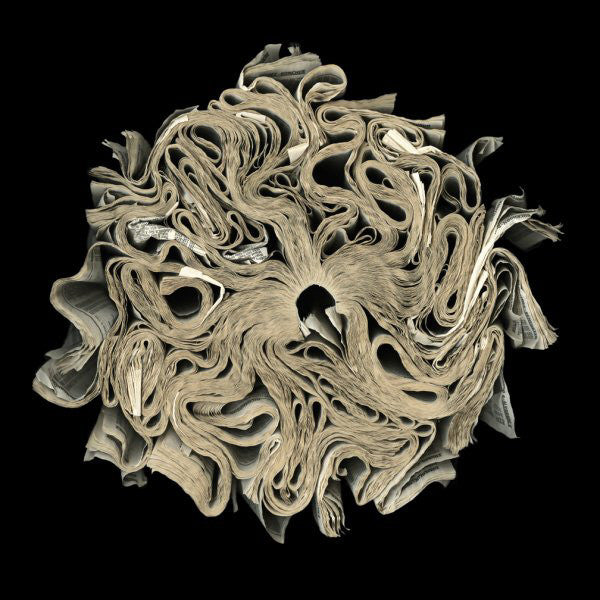 Cara Barer Artwork | Colourful and monochromatic photography orbs circular and organic abstract book art sculpture.