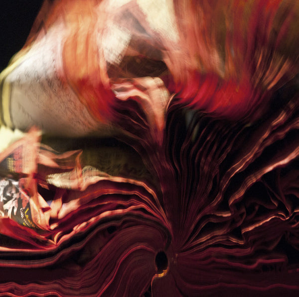 Cara Barer Artwork | Colourful and monochromatic photography orbs circular and organic abstract book art sculpture.