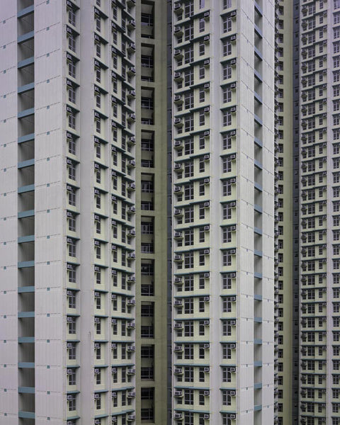 Michael Wolf Artwork | Dramatic muted large-format architectural photographs of Hong Kong Chicago and Paris, portraits from the Tokyo subway.