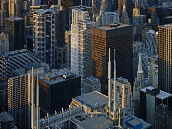 Michael Wolf Artwork | Dramatic muted large-format architectural photographs of Hong Kong Chicago and Paris, portraits from the Tokyo subway.