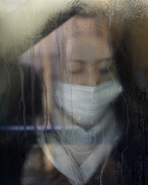 Michael Wolf Artwork | Dramatic muted large-format architectural photographs of Hong Kong Chicago and Paris, portraits from the Tokyo subway.