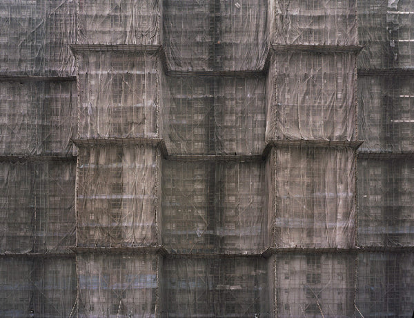 Michael Wolf Artwork | Dramatic muted large-format architectural photographs of Hong Kong Chicago and Paris, portraits from the Tokyo subway.