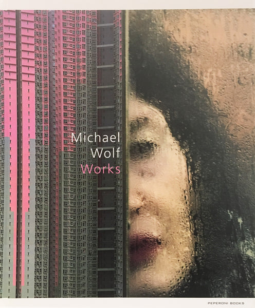 Michael Wolf Artwork | Dramatic muted large-format architectural photographs of Hong Kong Chicago and Paris, portraits from the Tokyo subway.