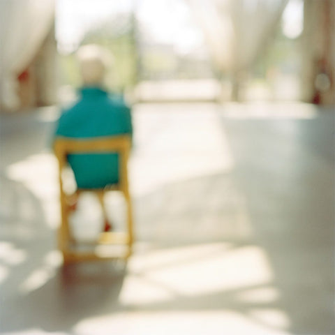 Untitled 11 (male figure and mustard coloured chair)